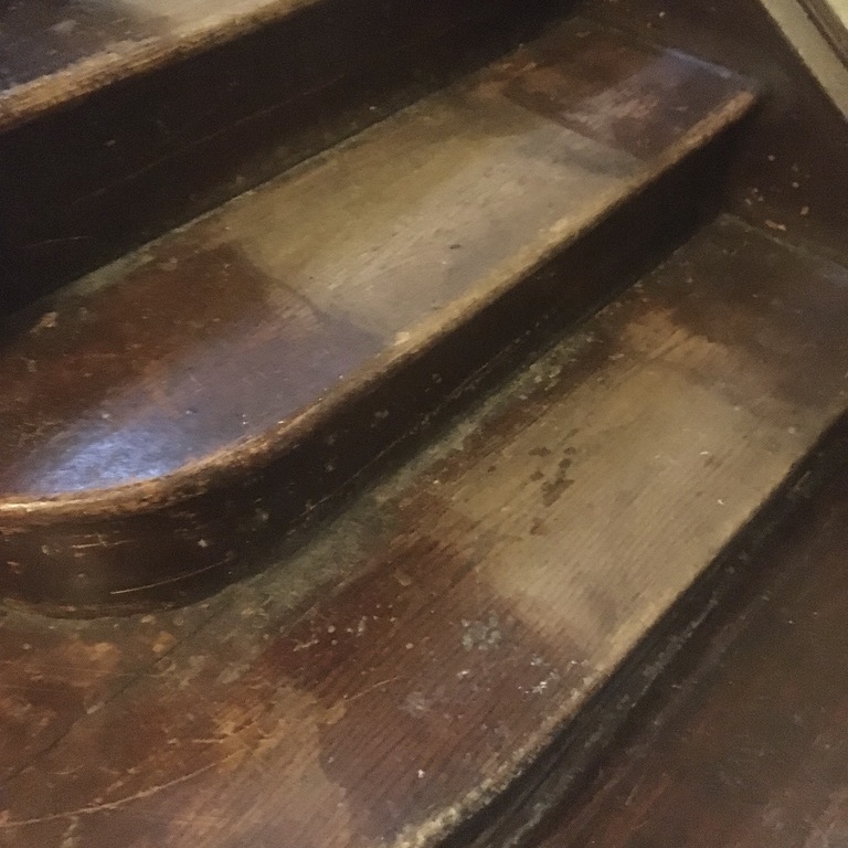 "Before" Image - Variation in Stair Finish after Carpet Removal