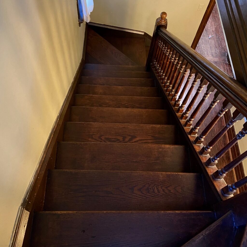 Overview of Completed Stair Restoration - Stained and Varnished to Compliment Original Finish