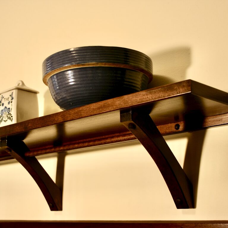 Shelf detail - custom shelf with bracket and matching finish